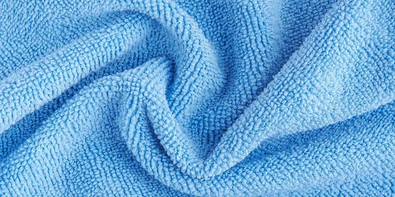 Close-up shot of a blue microfiber towel