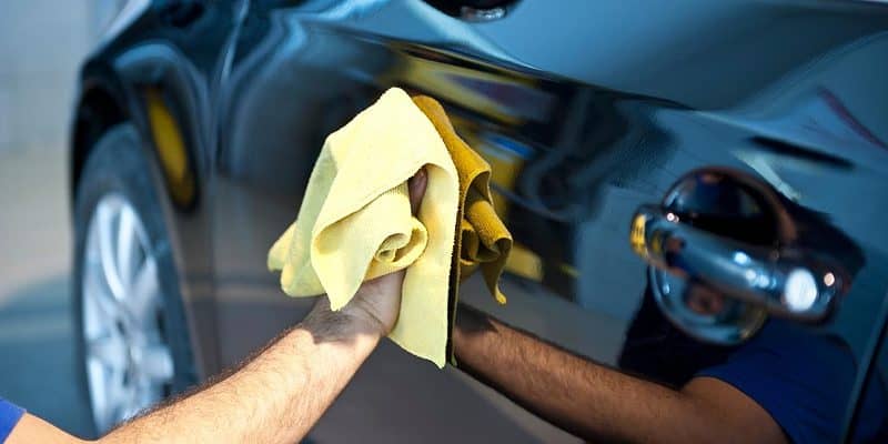 Wiping and shining a black car